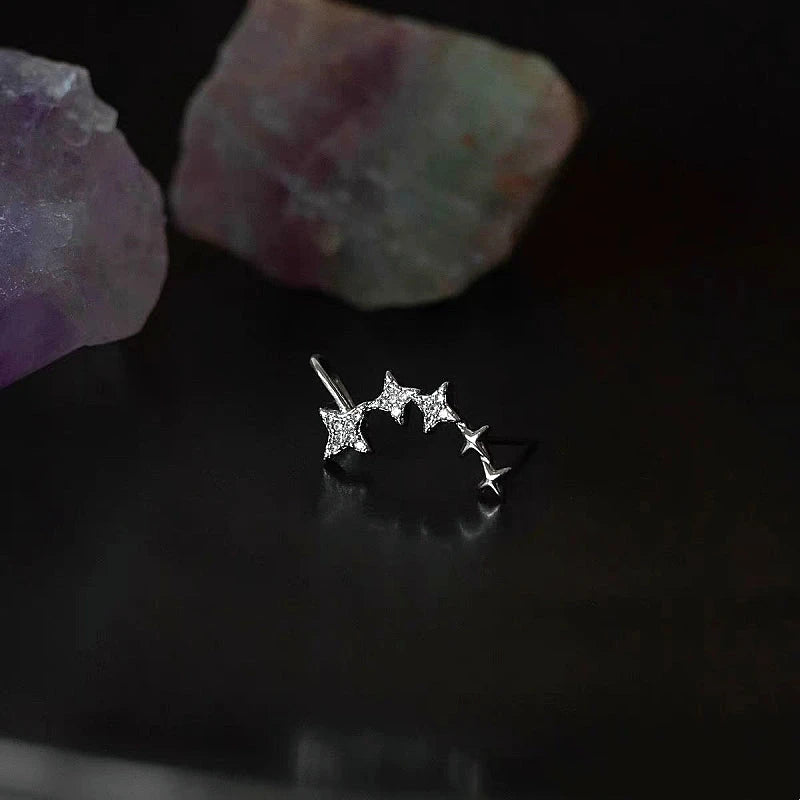 Close-up detail of the sparkling zircons and plating on the Star Crawler Earrings