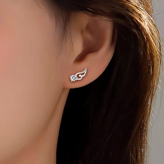 Model showcasing the dangle and style of the Sterling Silver Diamond Angel Wing Earrings