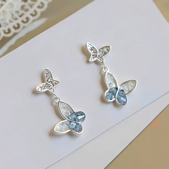 Angled view of the Sterling Silver Diamond Butterfly Earrings