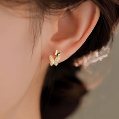 Angled view of the Sterling Silver Diamond Double-Butterfly Earrings