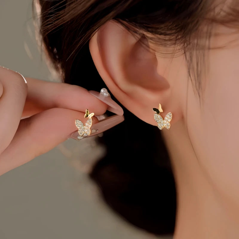 Close-up detail of the sparkling zircons and plating on the Double-Butterfly Earrings