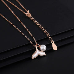 Sterling Silver Diamond Fishtail Pearl Necklaces worn to showcase its length and pendant detail