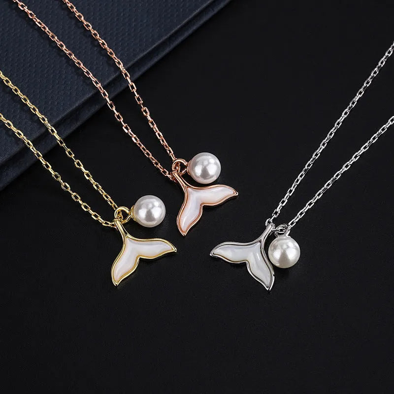 Close-up of the pendant and clasp on the Smiley Face Necklace