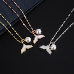 Close-up of the pendant and clasp on the Smiley Face Necklace