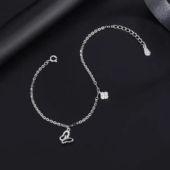 Close-up of the clasp and charm details on the Wishing Tree Necklace