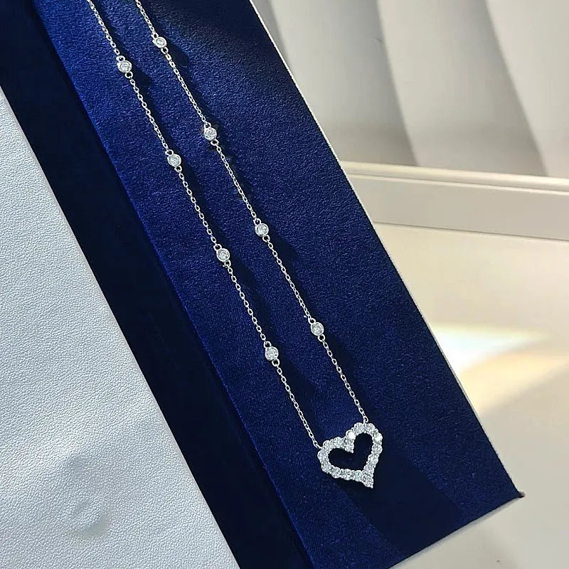 Sterling Silver Diamond Hollow Heart Necklaces worn to showcase its length and pendant detail