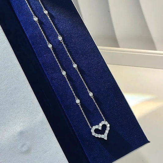 Sterling Silver Diamond Hollow Heart Necklaces worn to showcase its length and pendant detail