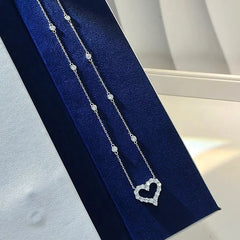 Sterling Silver Diamond Hollow Heart Necklaces worn to showcase its length and pendant detail