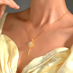 Close-up of the pendant and clasp on the Heart Pearl Necklace