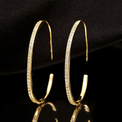 Angled view of the Sterling Silver Diamond Line C-Shaped Earrings