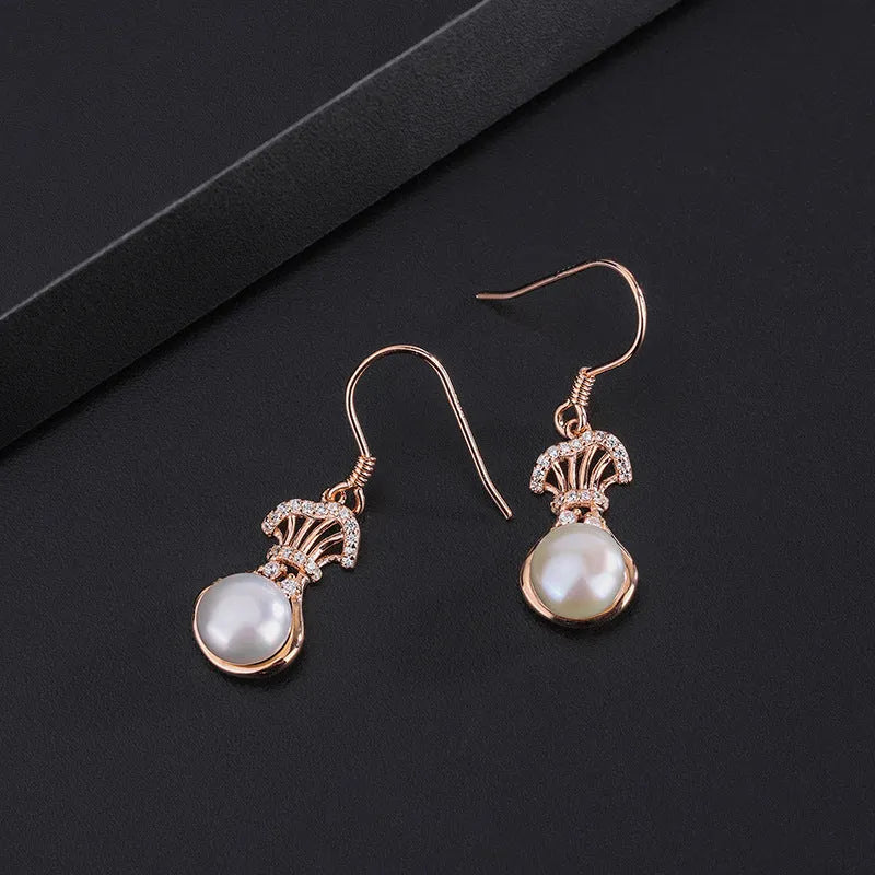 Close-up detail of the sparkling zircons and plating on the Pearl Tassel Necklace