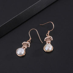 Close-up detail of the sparkling zircons and plating on the Pearl Tassel Necklace