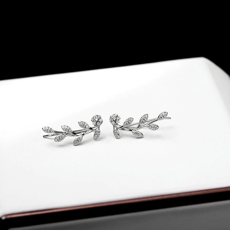 Close-up detail of the sparkling zircons and plating on the Four-Leaf Clover Bracelet