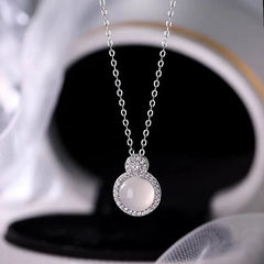 Detailed view of the Sterling Silver Diamond Round Gourd Necklaces chain and pendant