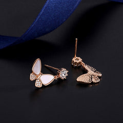 Angled view of the Sterling Silver Diamond Shell Butterfly Earrings