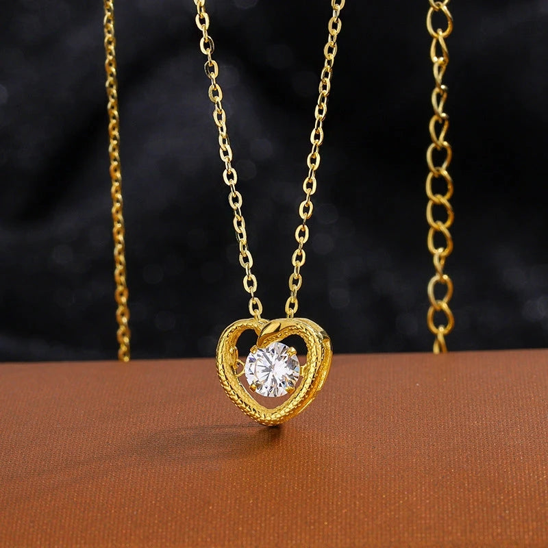 Detailed view of the Sterling Silver Diamond Snake Heart Earrings chain and pendant