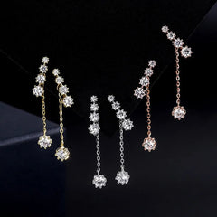 Model showcasing the dangle and style of the Sterling Silver Diamond Tassel Earrings