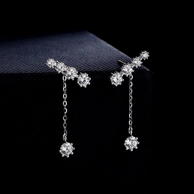 Close-up detail of the sparkling zircons and plating on the Oval Drop Earrings