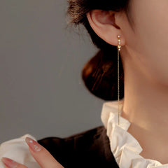 Angled view of the Sterling Silver Diamond Threader Earrings