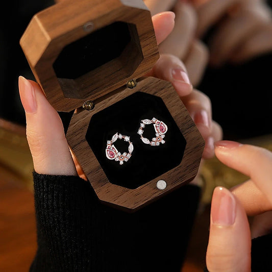 Model showcasing the dangle and style of the Sterling Silver Diamonds And Pink Zircon Tulip Earrings