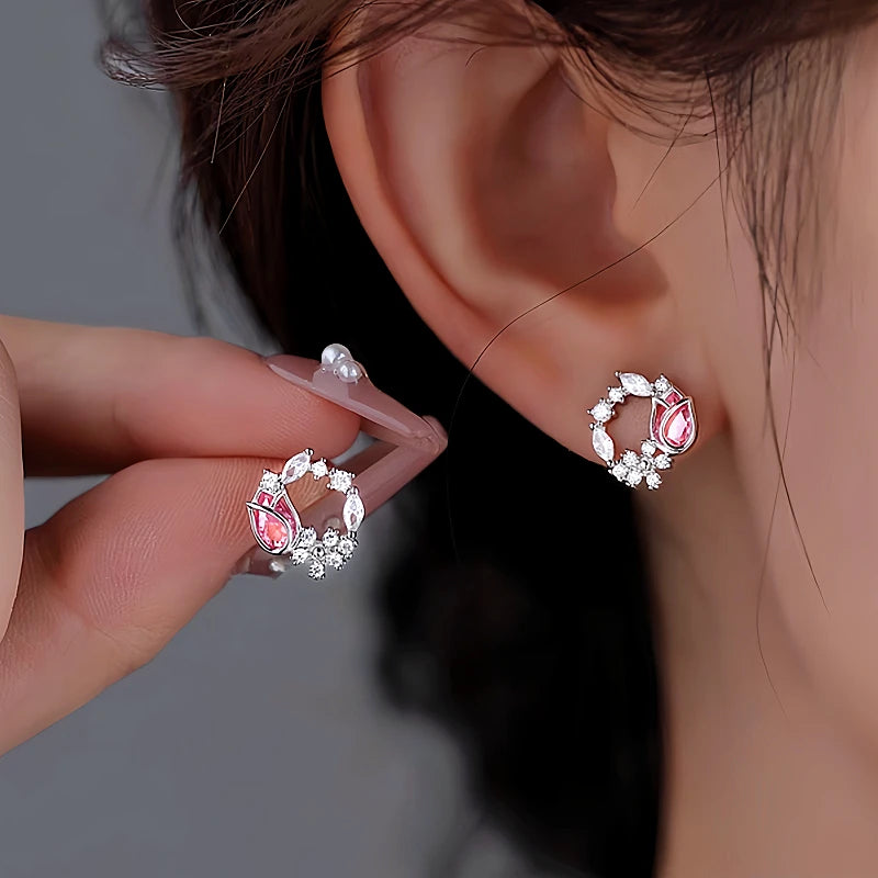 Angled view of the Sterling Silver Diamonds And Pink Zircon Tulip Earrings