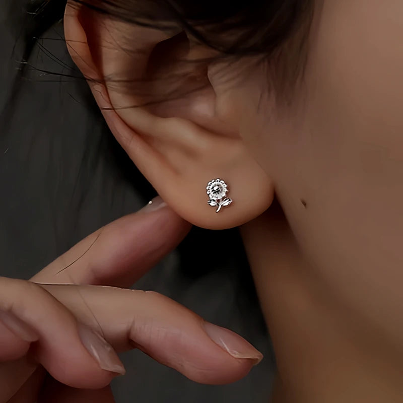 Close-up detail of the sparkling zircons and plating on the Star Stud Earrings