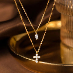 Sterling Silver Double-Layer Diamond Cross Necklace worn to showcase its length and pendant detail