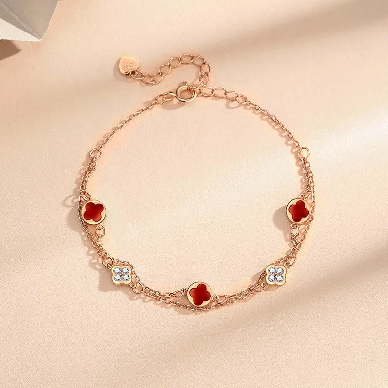 Model wearing the Sterling Silver Double-Layer Four-Leaf Clover Bracelets to highlight its design on the wrist