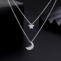 Close-up of the pendant and clasp on the Double Heart Necklace