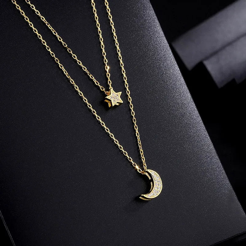 Detailed view of the Sterling Silver Double-Layer Star And Moon Necklace chain and pendant