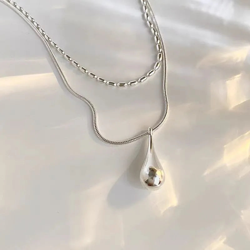 Detailed view of the Sterling Silver Double-Layer Water Drop Necklace chain and pendant