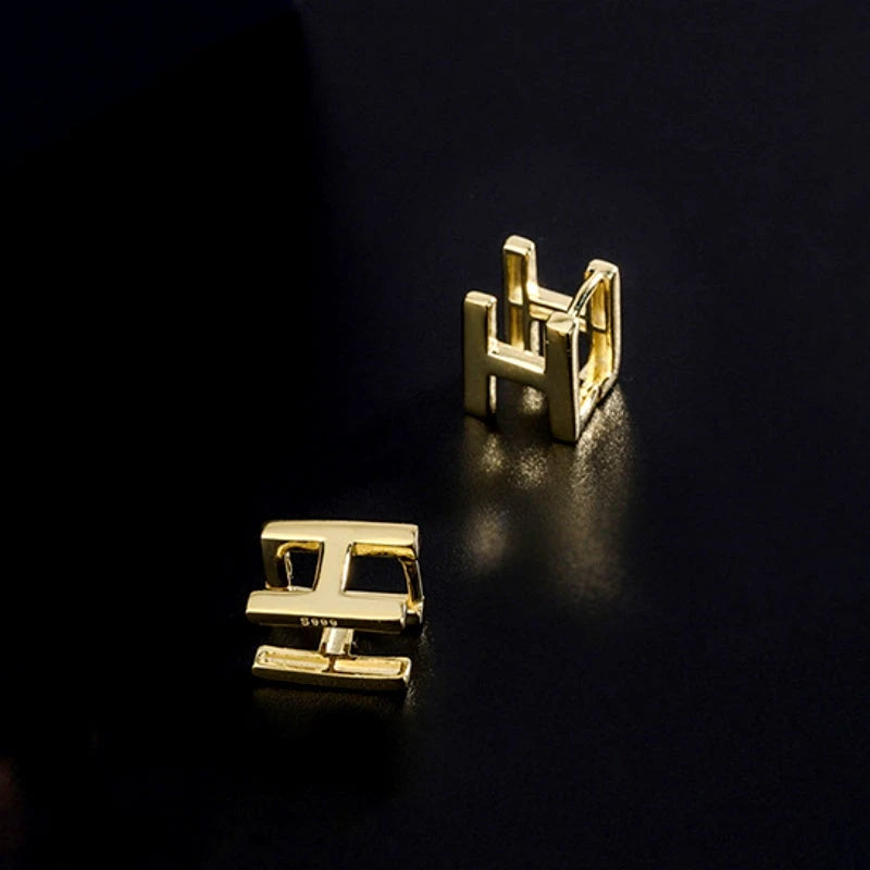 Close-up detail of the sparkling zircons and plating on the Cross Pearl Necklace