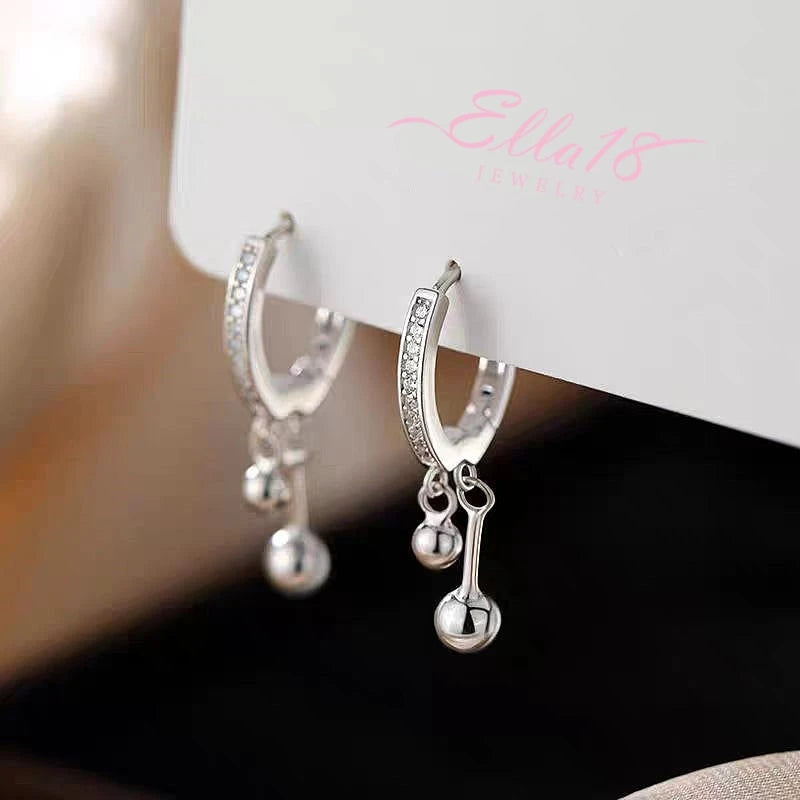 Angled view of the Sterling Silver Double Ball Earrings