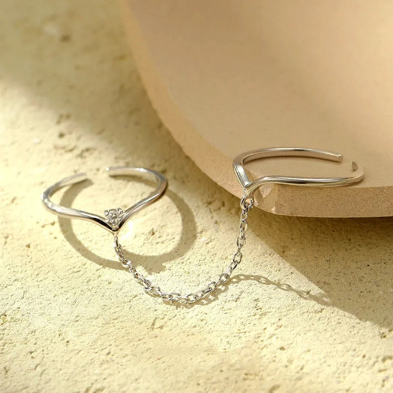 Top-down view of the sparkling Sterling Silver Double Chain Combination Ring