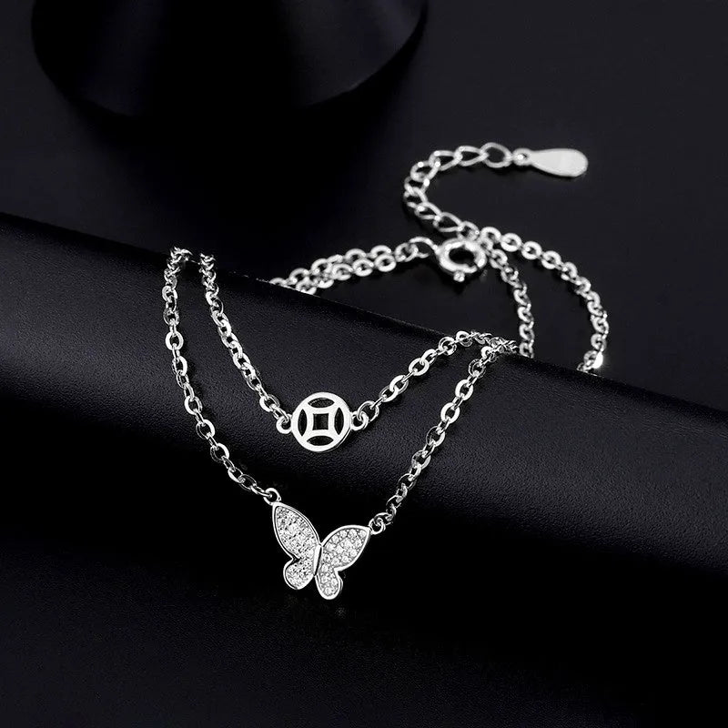 Close-up of the clasp and charm details on the Green Zircon Ring