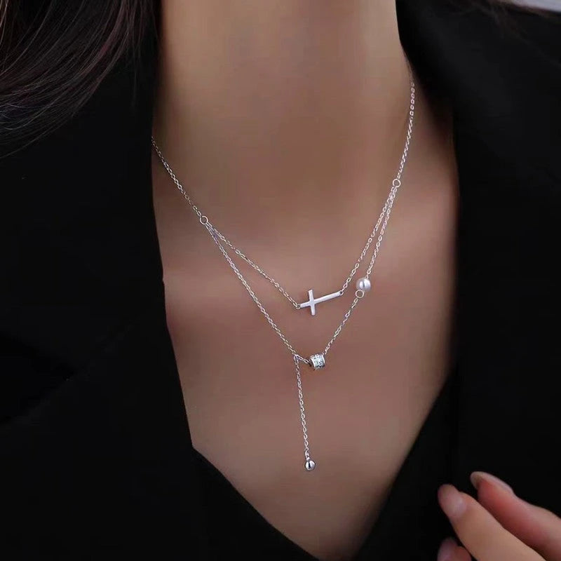 Close-up of the pendant and clasp on the Pink Tulip Earrings