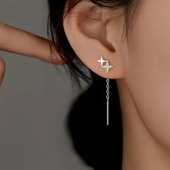 Model showcasing the dangle and style of the Sterling Silver Double Star Threader Earrings