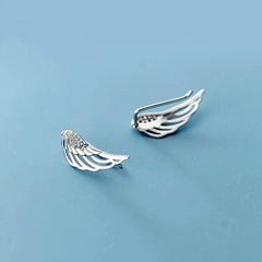 Close-up detail of the sparkling zircons and plating on the Layered Butterfly Earrings