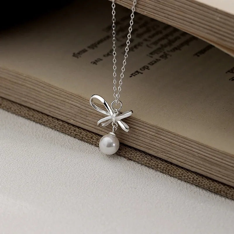 Sterling Silver Elegant Bow Pearl Necklace - beautiful Disc Necklace
