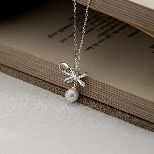 Sterling Silver Elegant Bow Pearl Necklace - beautiful Disc Necklace