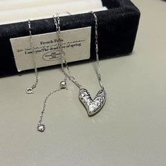 Detailed view of the Sterling Silver Elegant Broken Heart Necklace chain and pendant