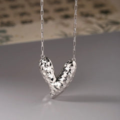 Sterling Silver Elegant Broken Heart Necklace worn to showcase its length and pendant detail