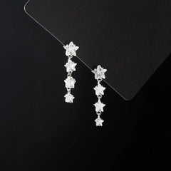 Close-up detail of the sparkling zircons and plating on the Letter H Earrings