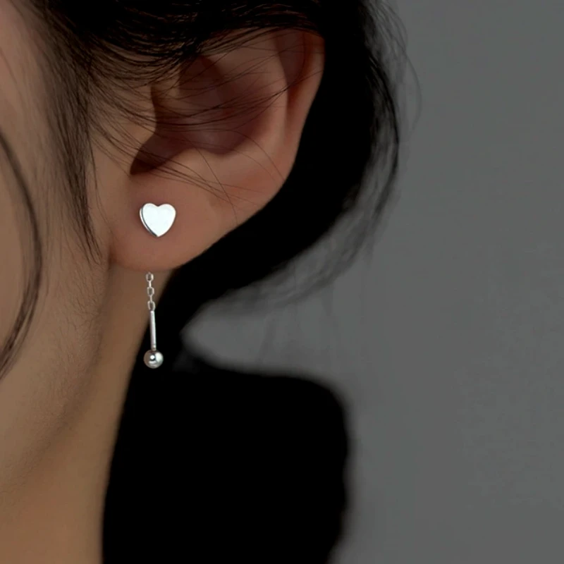 Close-up detail of the sparkling zircons and plating on the Star Stud Earrings