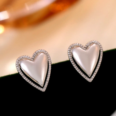 Angled view of the Sterling Silver Elegant Heart Studs