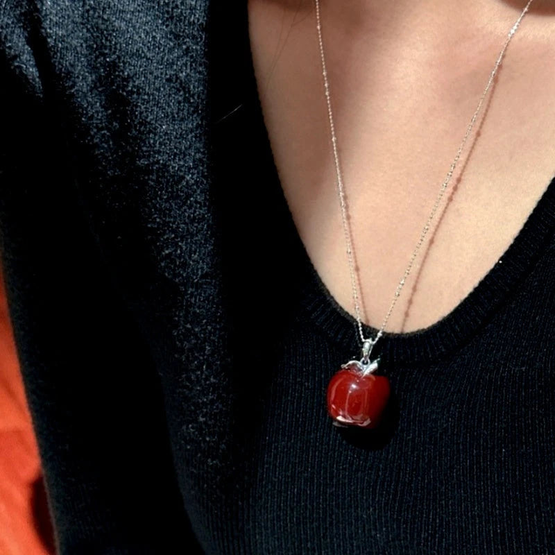 Sterling Silver Elegant Red Apple Necklace worn to showcase its length and pendant detail