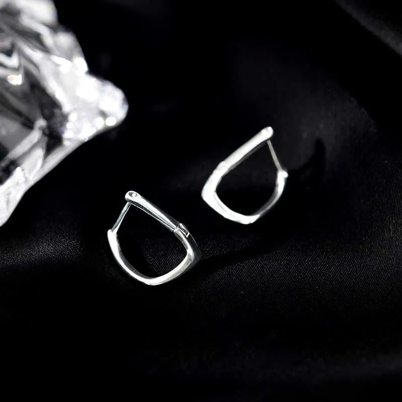 Close-up detail of the sparkling zircons and plating on the Twisted Geometric Earrings