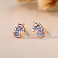 Angled view of the Sterling Silver Elegant Unicorn Studs