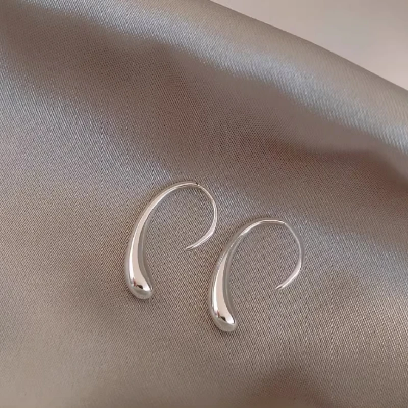 Close-up detail of the sparkling zircons and plating on the Water Drop Ear Hooks