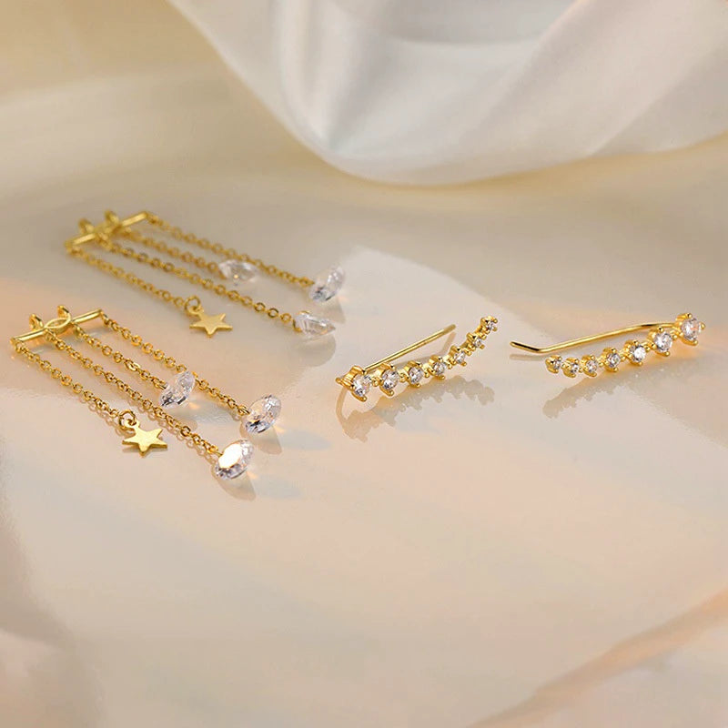 Close-up detail of the sparkling zircons and plating on the Star Tassel Earrings